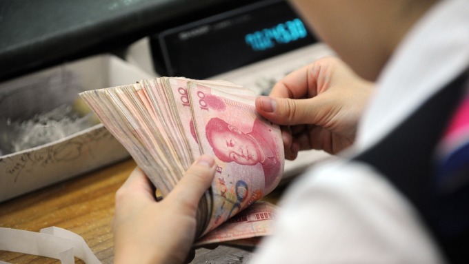 人行放手市場(chǎng)人士：人民幣本周下探6.9也不意外